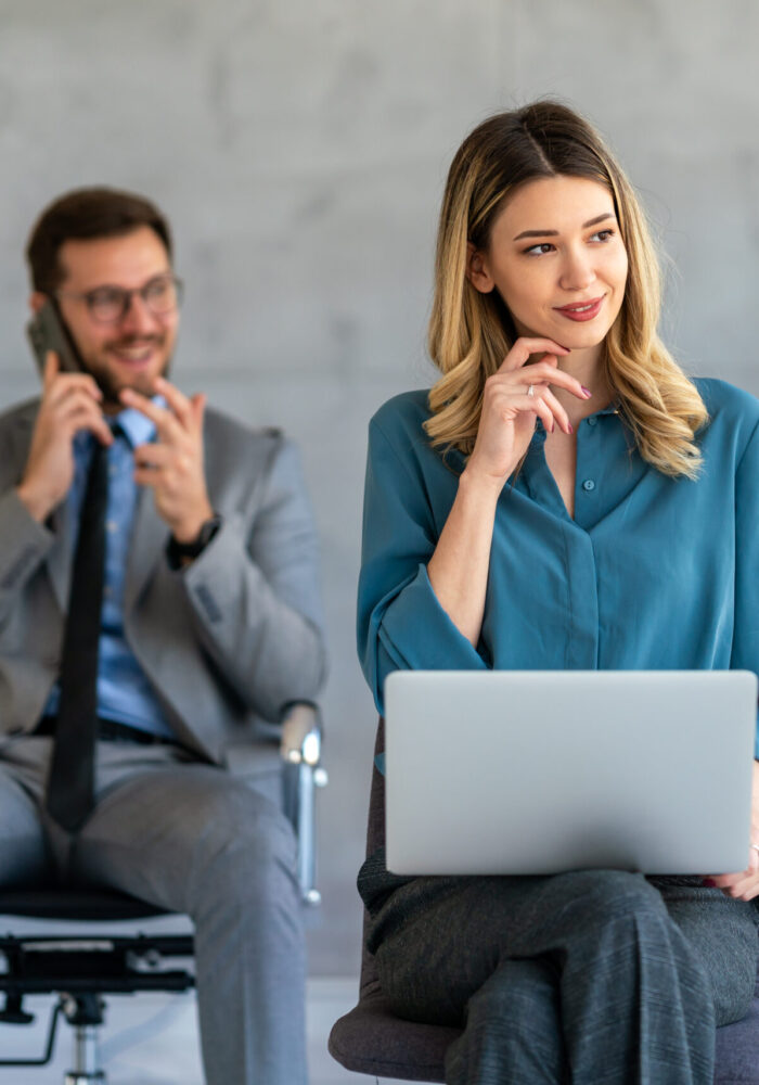 Thoughtful businesspeople working together at office workplace. Concept of team work, business education, internet surfing, brainstorm, project information technology