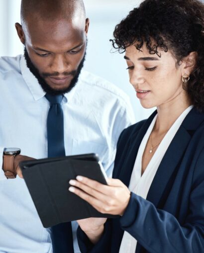 Office tablet, African teamwork and business people review finance portfolio feedback, stock market.